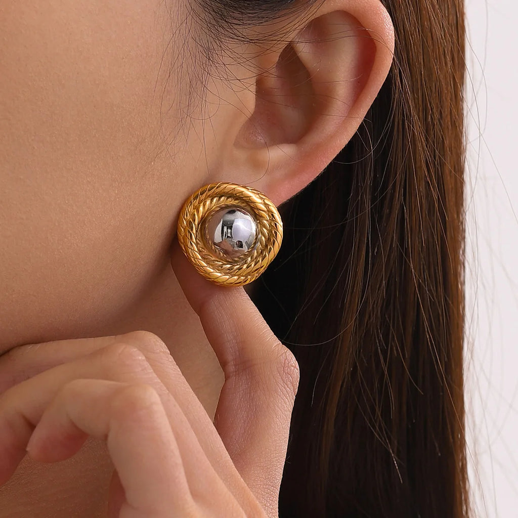 Gold plated and silver tone earrings