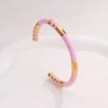 Stainless steel bracelet with colored segments