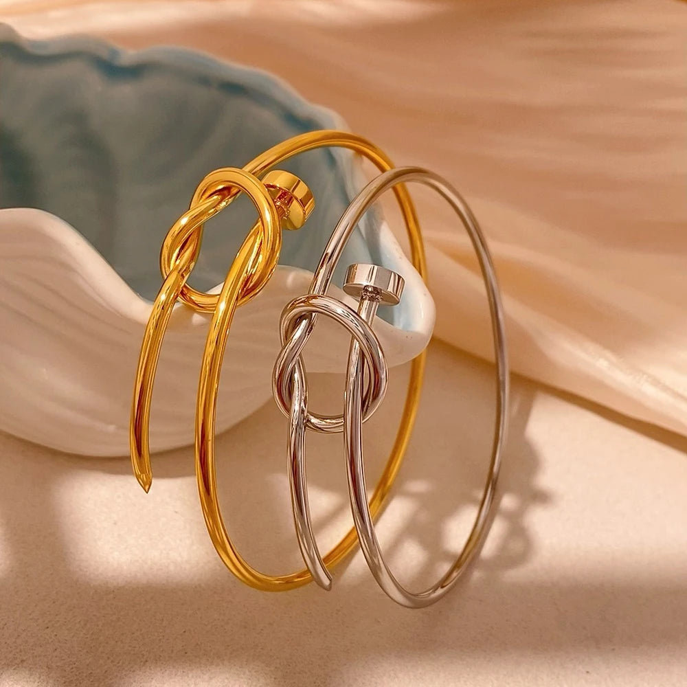 Gold plated or silver tone bracelet with polished finish