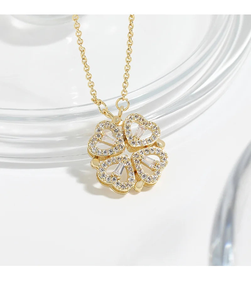 Gold tone floral pendant necklace with zircon detail by Amelya Paris