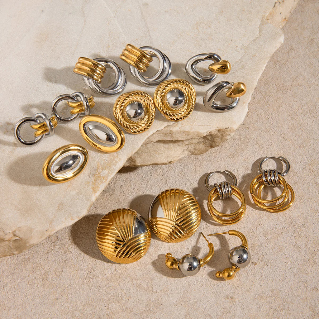 Gold plated and silver tone earrings