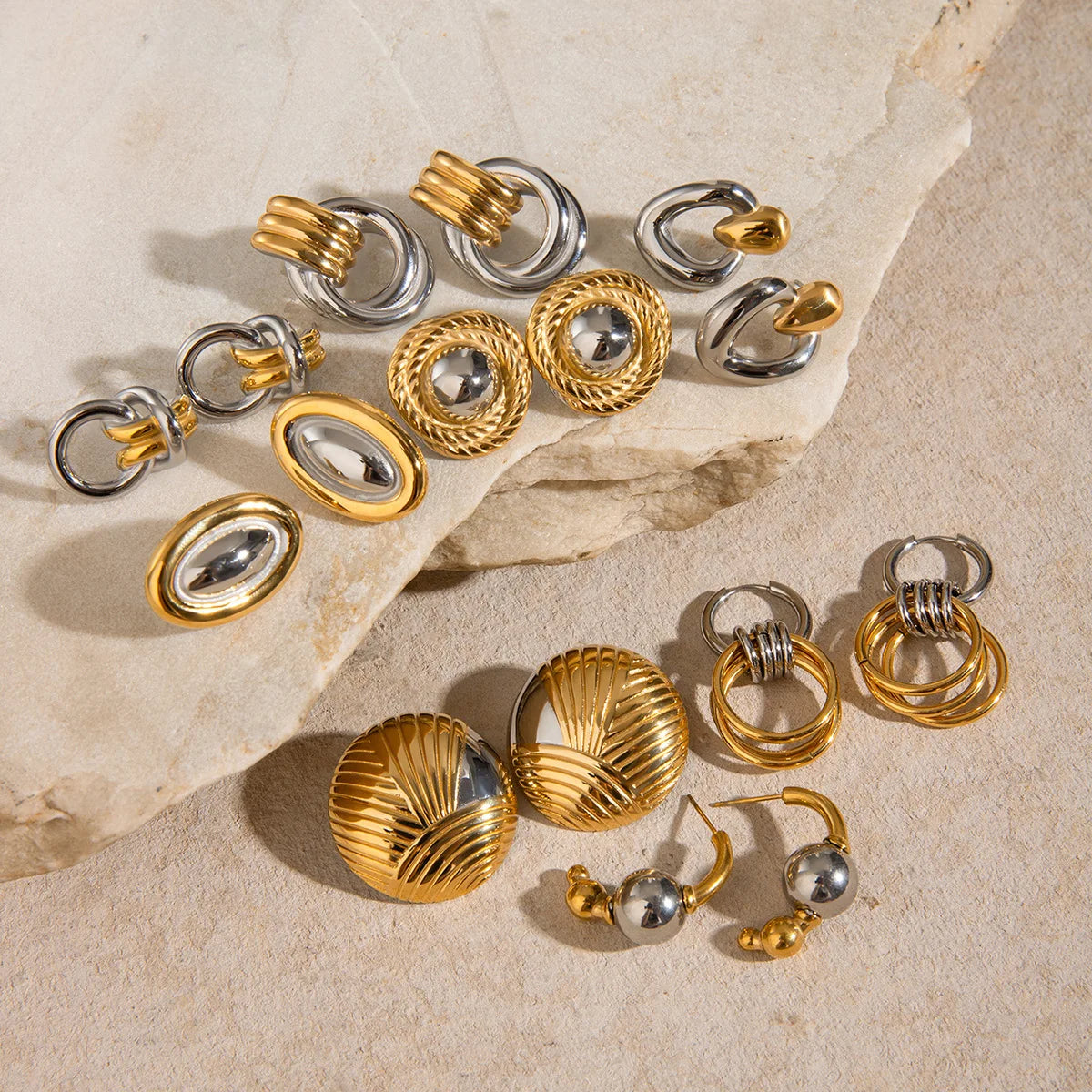 Gold plated and silver tone earrings