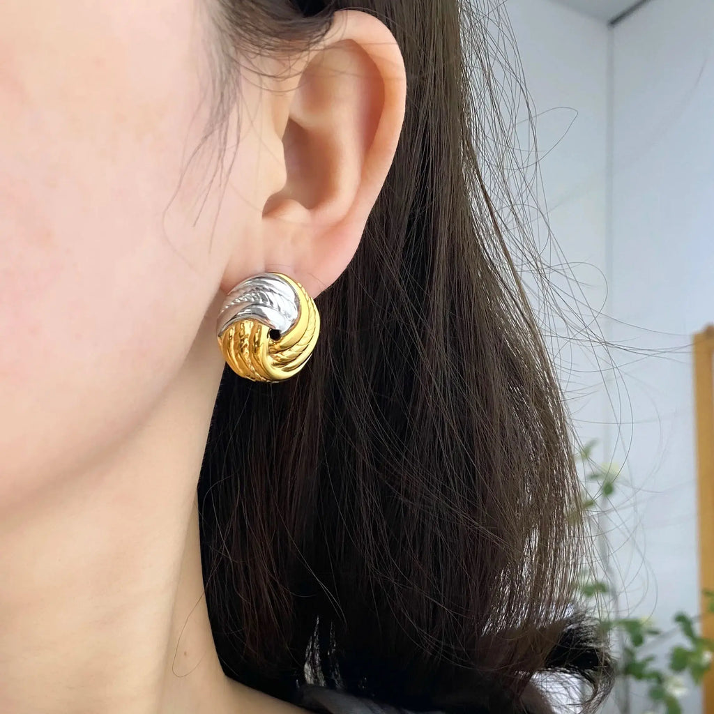 Gold plated and silver tone earrings