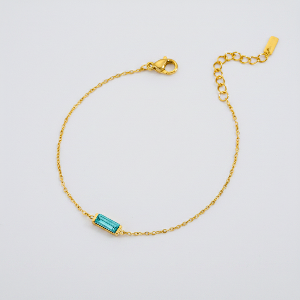 Gold-tone bracelet with colored stone detail