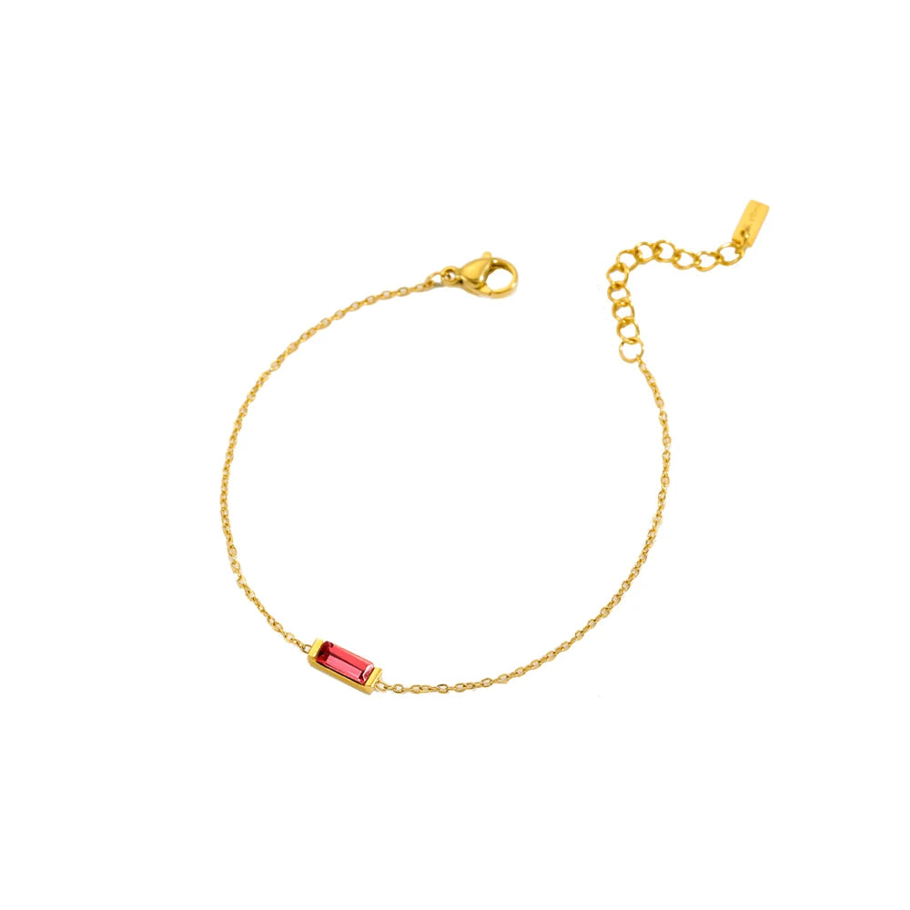 Gold-tone bracelet with colored stone detail