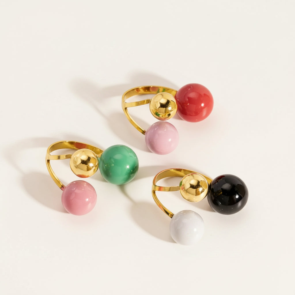 lollipop  gold plated stainless steel ring featuring a sculptural three-sphere design by Amelya Paris