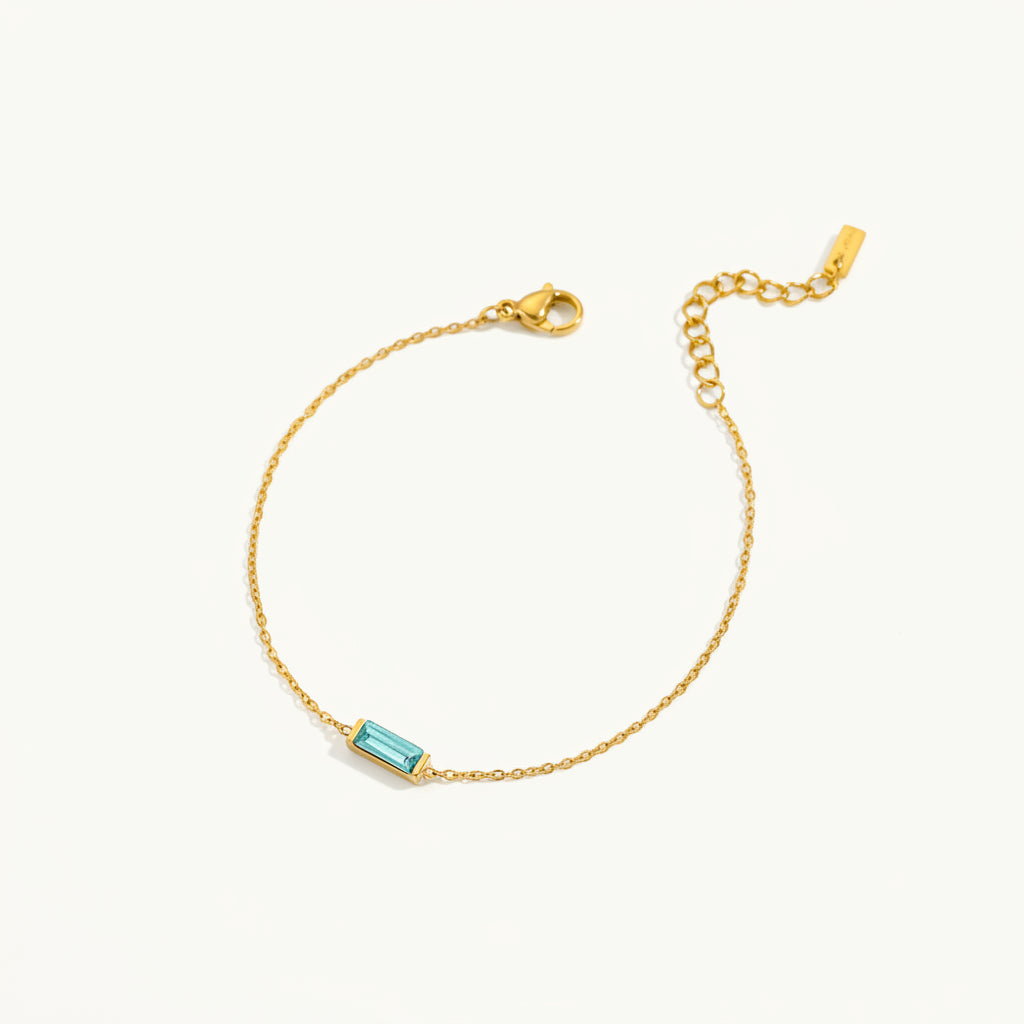 Gold-tone bracelet with colored stone detail