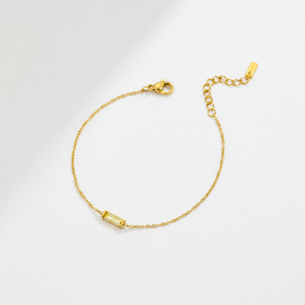 Gold-tone bracelet with colored stone detail