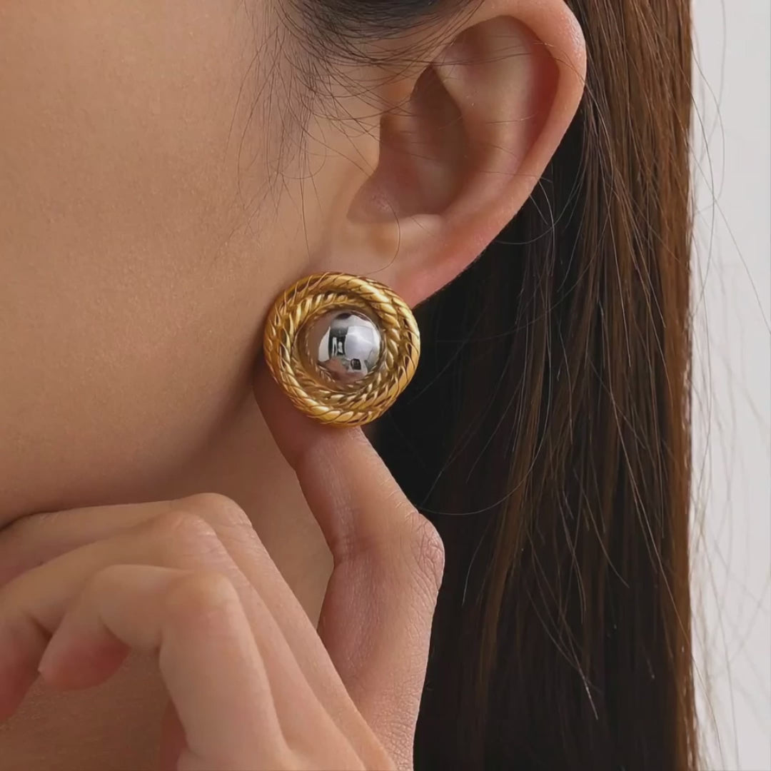 Gold plated and silver tone earrings